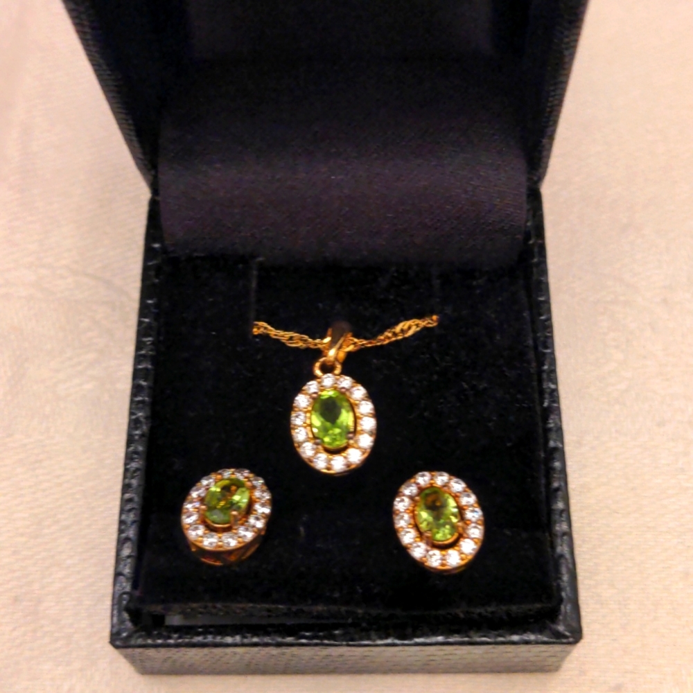 Peridot pendant and earrings set.  NWOT,  gold plated from Gold Coast. Gift box